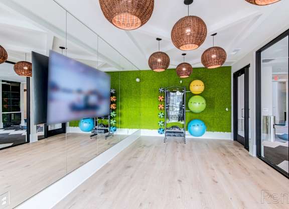 yoga room at Tapestry Nona Apartments in Orlando, FL