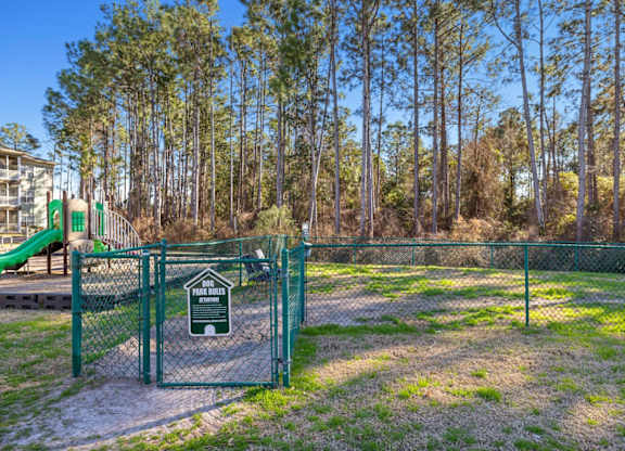 A playground with a sign that says "The Bubbles".