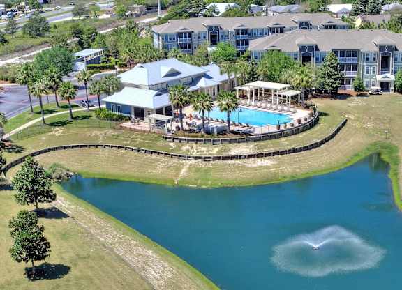 A large house with a pool and a gazebo.