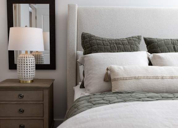 A bedroom with oversized furniture at 2020 Providence in Huntsville, AL