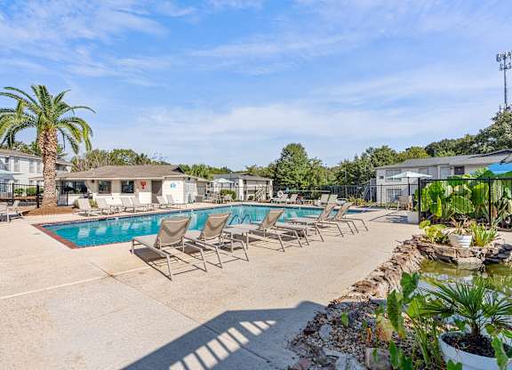 sparkling pool and sundeck at 701 South Apartments in Mobile, AL