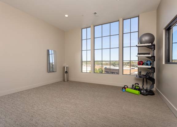 yoga room with large windows at 2020 Providence in Huntsville, AL