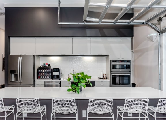 indoor/outdoor social club and bar with kitchen at Anthem Apartments and Cottages in Huntsville, Alabama
