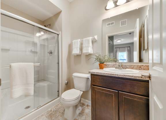 Modern Bathrooms with Showers at Austin Place Apartments