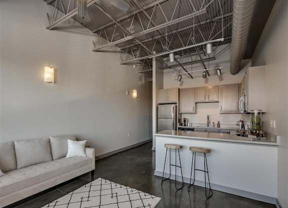 Living Rom With Kitchen Area at The Tower Apartments, Tuscaloosa, 35401