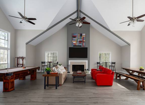 Clubhouse featuring seating and a pool table at Summerchase at Riverchase in Hoover, Alabama