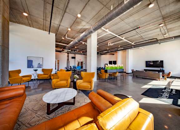 Clubhouse featuring seating and a TV at Wesley Place Apartments in Indianapolis, IN