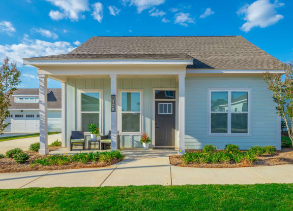 cottage with front porch cottage at Anthem Apartments and Cottages in Huntsville, Alabama