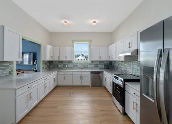 Clubhouse Kitchen at Cottages at Foley Farms Apartments in Foley, AL