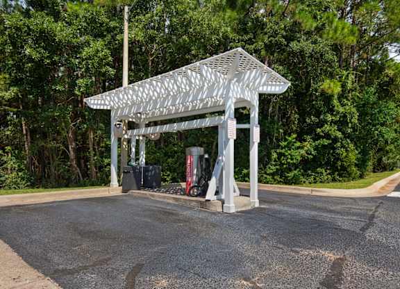 Covered car care center with a car vacuum at Crystal Lake in Pensacola, Florida.