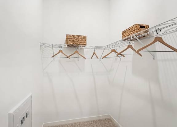 A large closet with wire rack shelving at Tapestry University Park apartments in Sarasota, FL