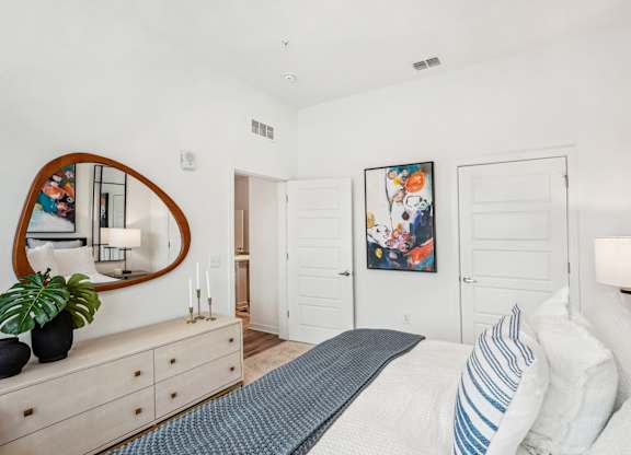 a bedroom with ensuite bathroom at Tapestry University Park apartments in Sarasota, FL