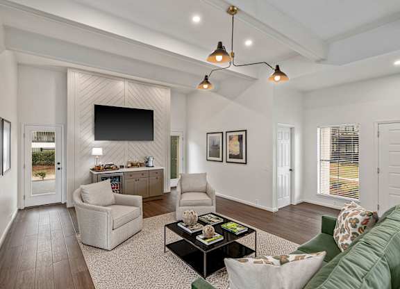 Resident clubhouse with tv and seating at Oakley at Hillcrest in Mobile, AL