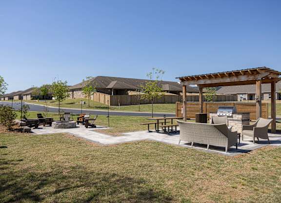 A park with a pavilion and seating area.