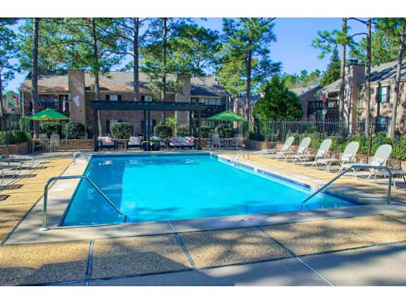 a swimming pool at at The Oakley at Hillcrest in Mobile, AL
