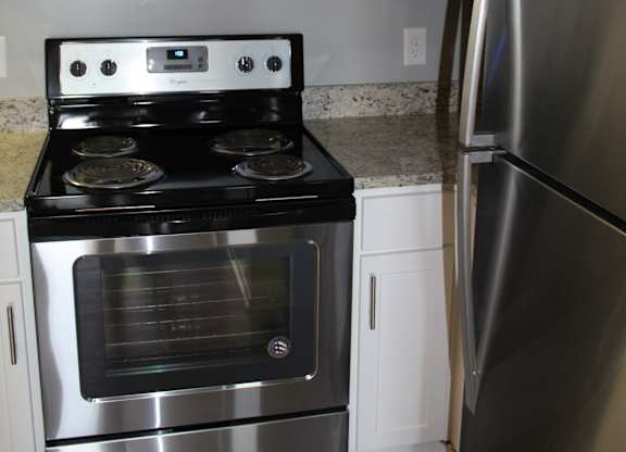 Stainless steel appliances at The Avery at Auburn Apartments in Auburn, AL