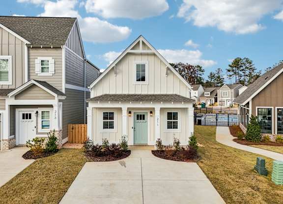 Exterior Cottage with white siding  at Turnberry Park in Gardendale, AL