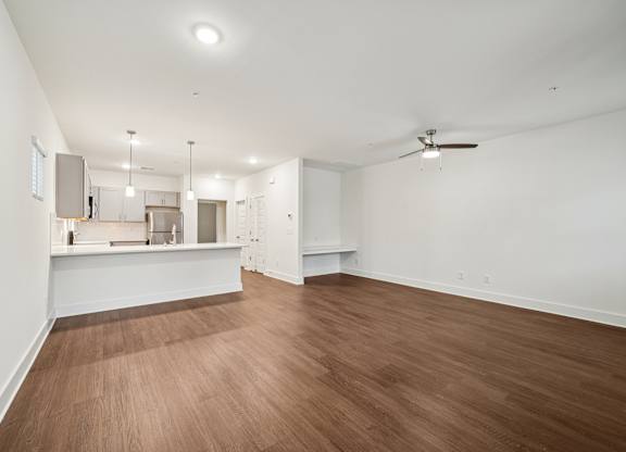 Open concept living and kitchen at Turnberry Park Apartments in Gardendale, AL