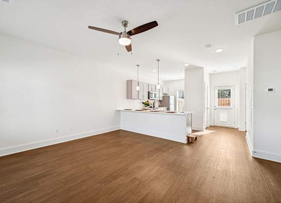 Open concept living and kitchen at Turnberry Park Apartments in Gardendale, AL