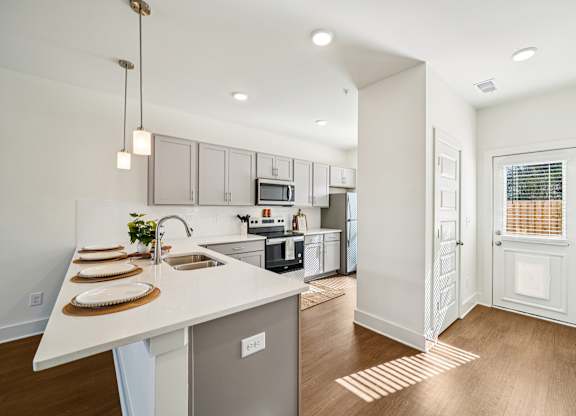 Large kitchen with island seating at Turnberry Park Apartments in Gardendale, AL