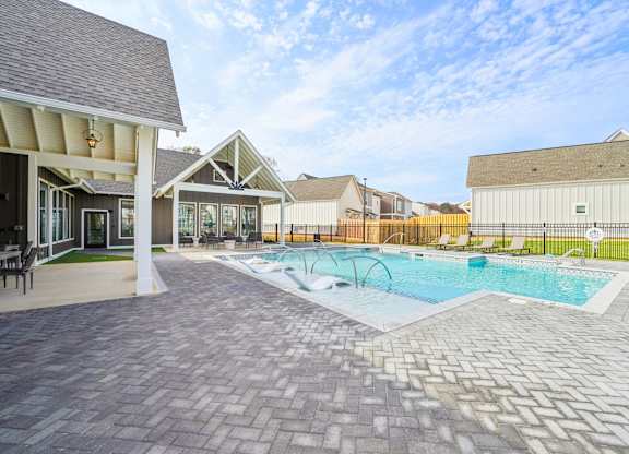 Resort-style pool and lounge area at Turnberry Park Apartments in Gardendale, AL