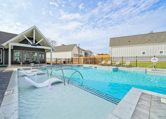 Resort-style pool with sundeck  at Turnberry Park Apartments in Gardendale, AL