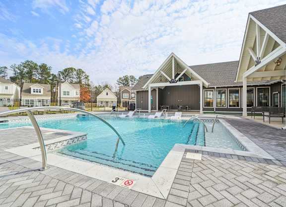 Exterior amenity - resort-style pool with sundeck at Turnberry Park Apartments in Gardendale, AL