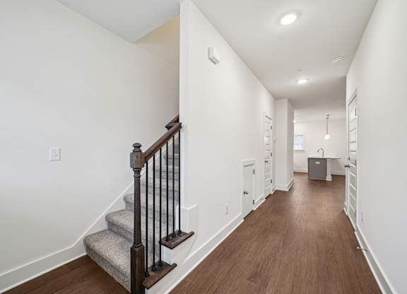 Hallway and stairs Willow floor plan at Turnberry Park Apartments in Gardendale, AL