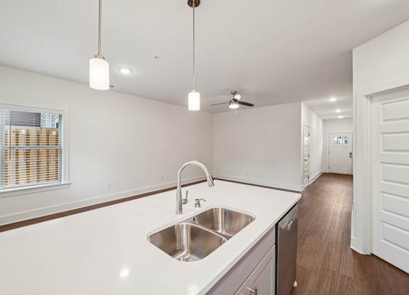 Modern kitchen with undermount sink at Turnberry Park Apartments in Gardendale, AL
