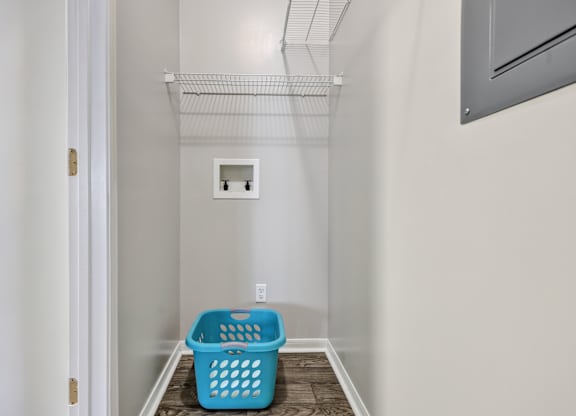 Laundry room at Village at Caldwell Mill Apartments in Birmingham, AL