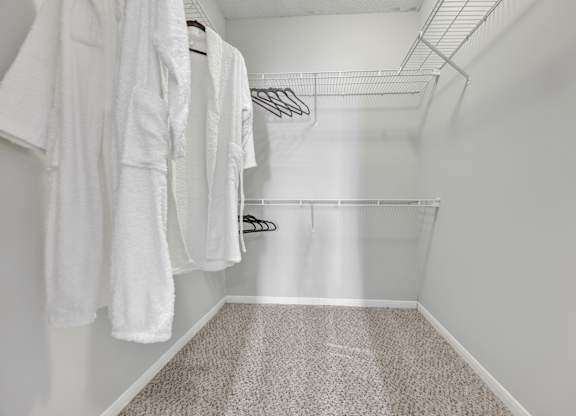 walk-in closet at Village at Caldwell apartments in Birmingham, AL