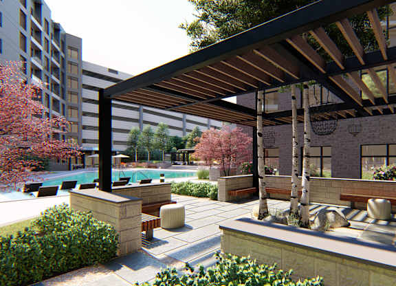 Poolside lounge area and covered pavilion at Zen City Center Troy, MI