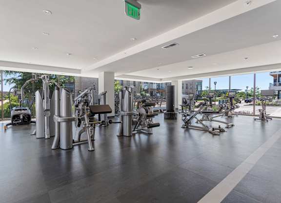 a gym with a view of the city