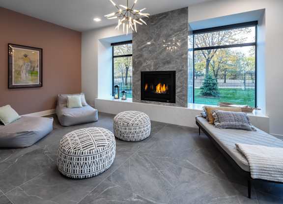the stairs in the interior of a house with a fireplace