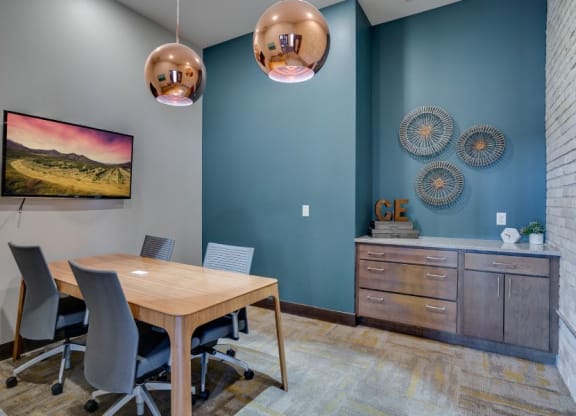 Conference room with TV sharing technology C&E Living in St Paul, MN