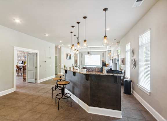 a view of the kitchen and dining area from the living room
