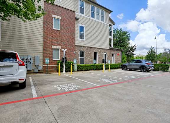 A parking lot with a red line painted on the ground.