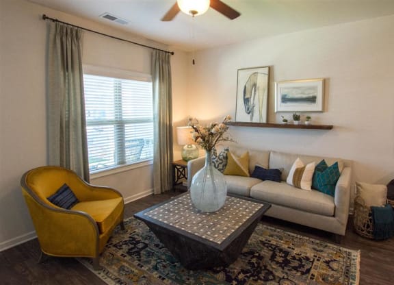 a living room with a couch and a table