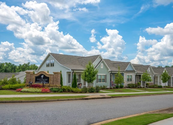 a row of houses on the side of a street