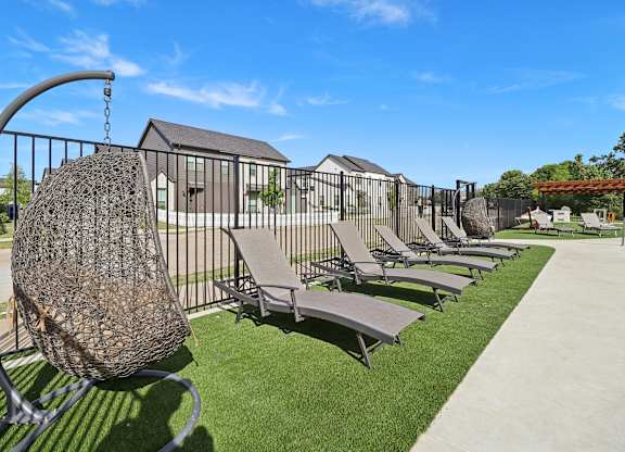 Poolside sundeck at Townhomes at Princeton Meadows, rental homes in Princeton, TX