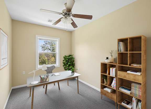 A room with a ceiling fan, a window, a desk, and a bookshelf.