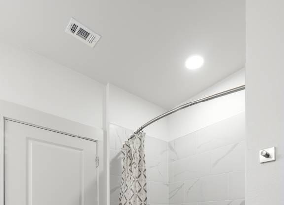 a bathroom with a large soaking tub