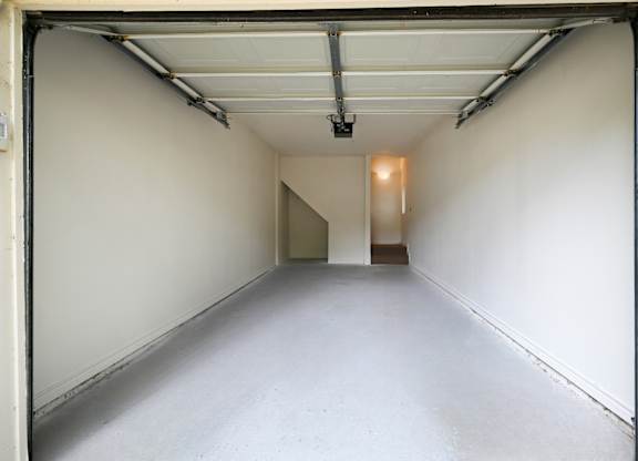 empty spacious one car garage at St Moritz in Dallas Texas
