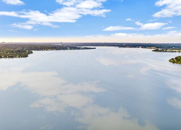A large body of water surrounded by land.
