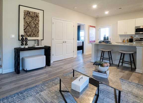 Tuscon - living room, kitchen and stairs to second floor
