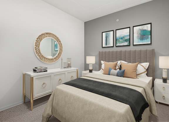 a bedroom with a large bed and a mirror