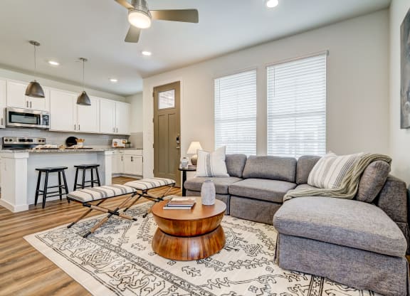large living room with natural light and open floor plan