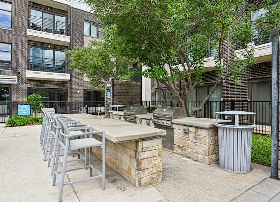 Grilling Station at Pool with Bar Stools Markethaus 3700 Plano Texas