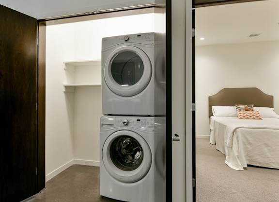 Stackable Front loading washer and dryer in linen closet