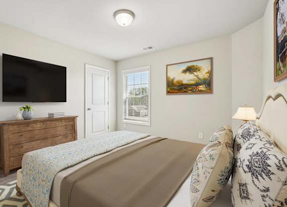 A bedroom with a bed, dresser, and a painting on the wall.